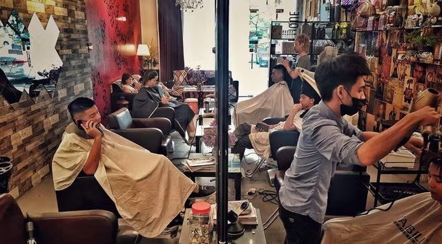 Stylist cutting a client's hair